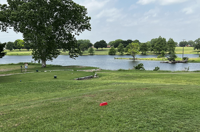 men on golf course